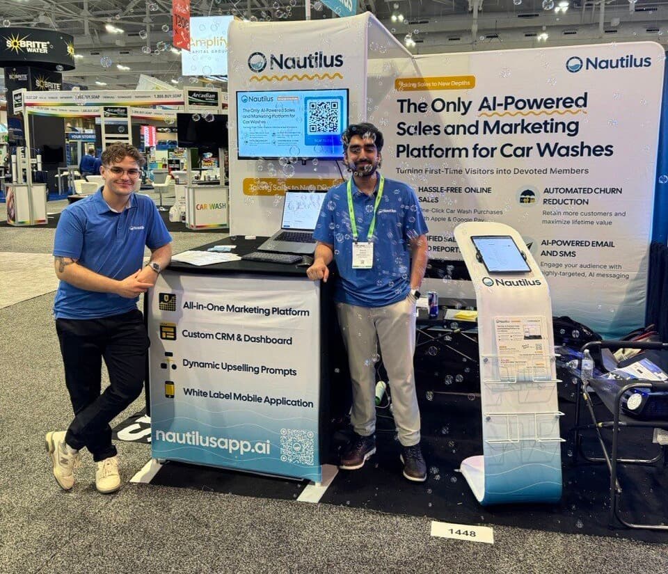 Nautilus co-founders Ali and Amayr at the Nautilus booth during a car wash industry trade show
